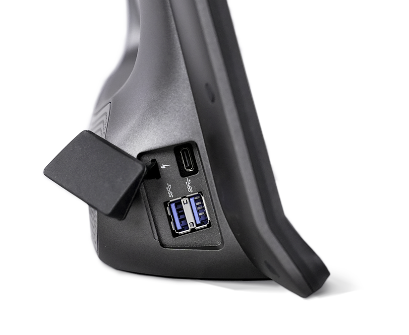 Tobii Dynavox TD I-Series AAC-enhet sett fra siden med dobbelt USB-port og beskyttelsesdeksel